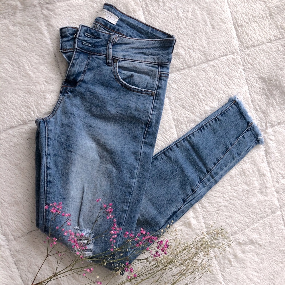 Mid Rise Distressed Jeans